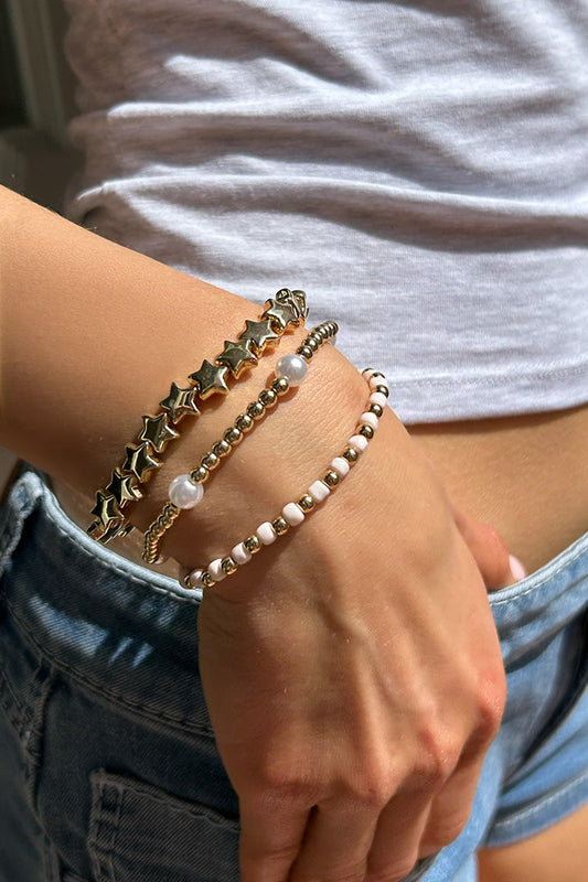 Set of beaded and star-shaped bracelets | Subdued Trusted