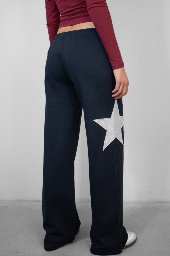 Wide-leg joggers with star | Subdued Featured