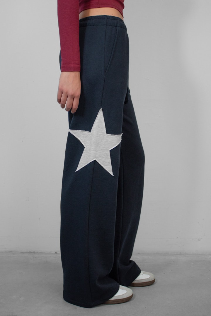 Wide-leg joggers with star | Subdued Featured