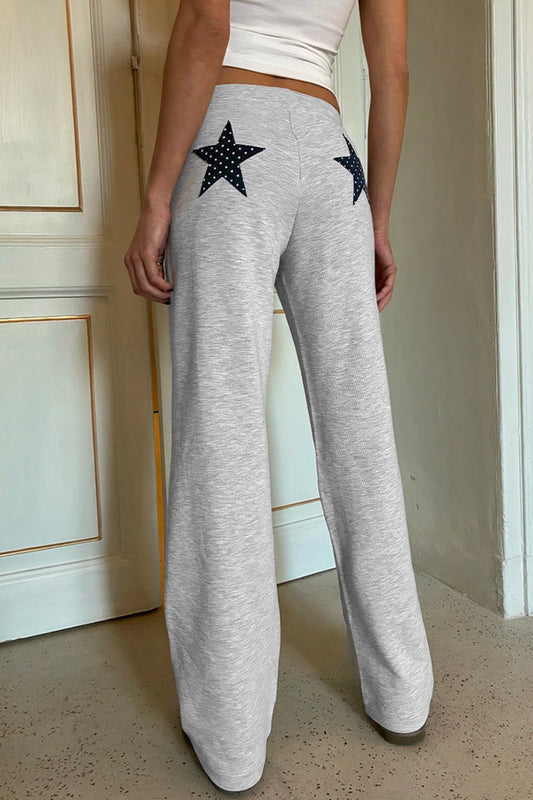 Wide-leg joggers with stars patch | Subdued Essential